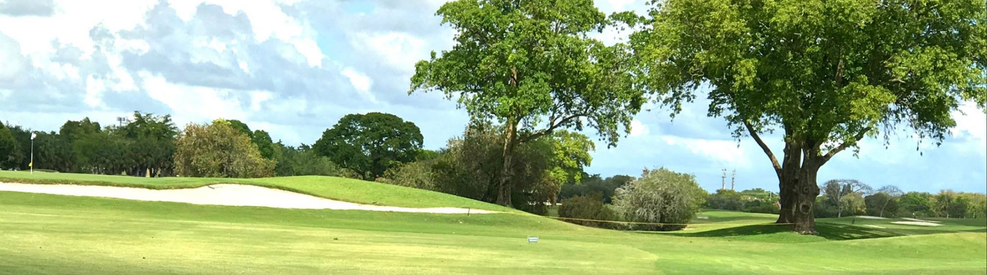 View of golf course with bunker